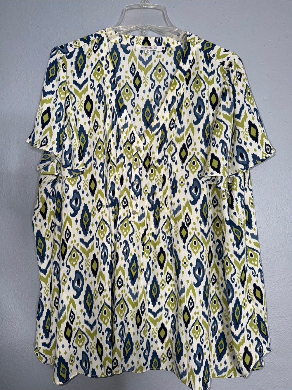 Rose & Olive White V-Neck Blouse with Green & Blue Ikat Print